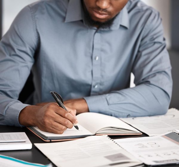 businessman-hands-notebook-writing-financial-planning-advertising-company-creative-marketing-startup-worker-paper-documents-finance-research-target-audience-kpi-growth-budget (1)